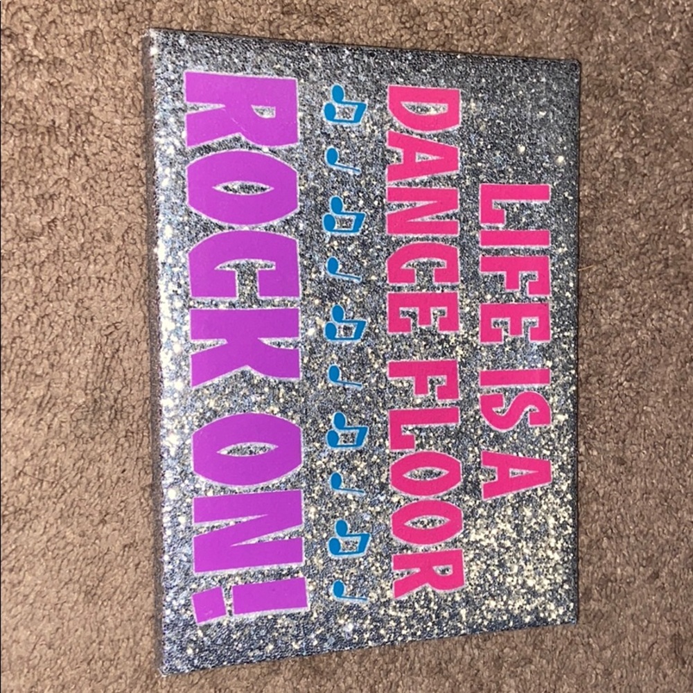 “Life is a dance floor, rock on!” Sign